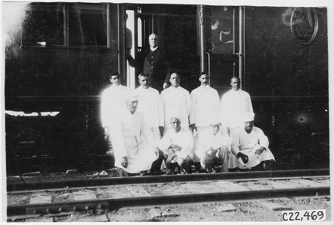 Pullman employees pose in front of railroad car in Kearney, Neb., at 1909 Glidden Tour