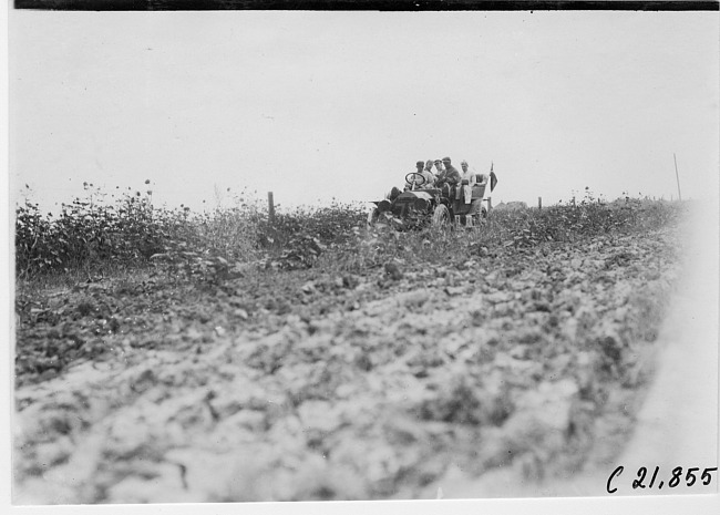 Thomas car #76 at a bad ditch on the prairie at the 1909 Glidden Tour