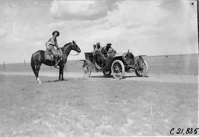Moline car #101and cowboy on the prairie at the 1909 Glidden Tour