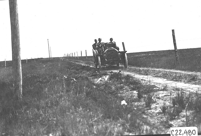 Harry Bill in Chalmers car #53 on the prairie, at the 1909 Glidden Tour