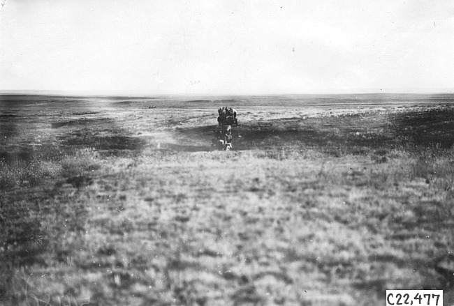 Glidden cars crossing prairie, at the 1909 Glidden Tour