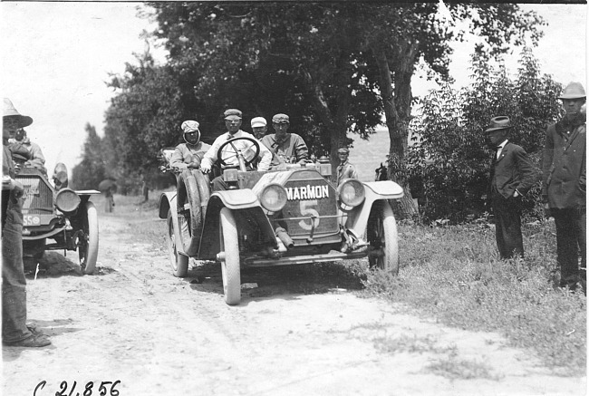 H.C. Marmon in Marmon car on rural road at Ft. Morgan, Colo., at 1909 Glidden Tour