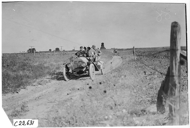 Glidden tourists on a rutted, rural road in Colo., at 1909 Glidden Tour