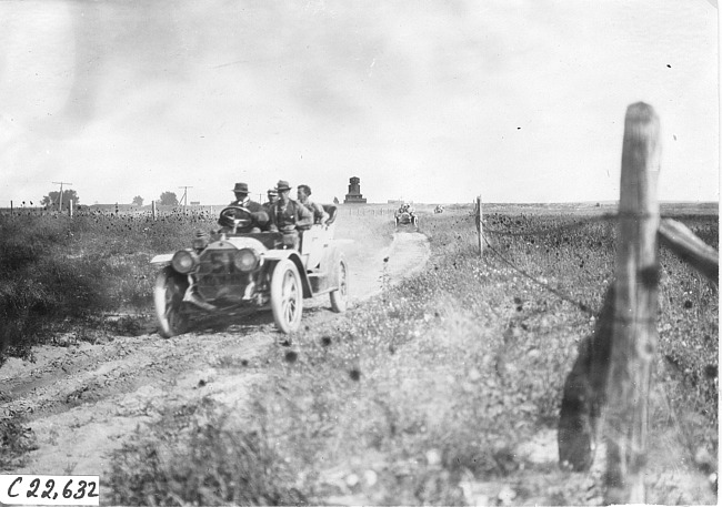 Glidden tourists on a rutted, rural road in Colo., at 1909 Glidden Tour