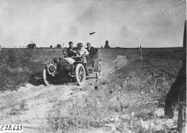 Glidden tourists on a rutted, rural road on the Colorado prairie, at 1909 Glidden Tour