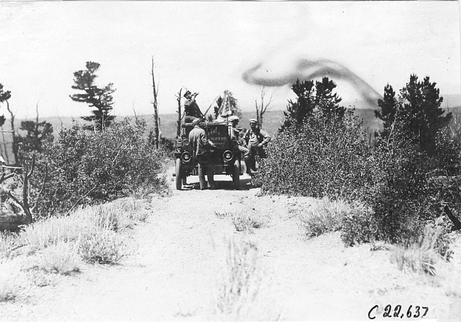 Rapid motor car stopped along a rural road in Colorado, at 1909 Glidden Tour