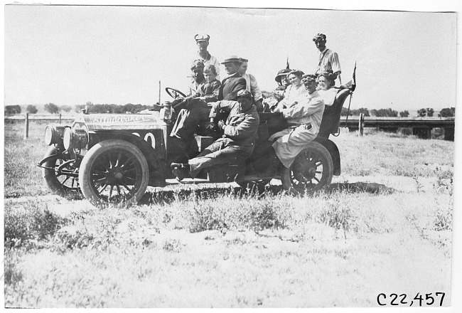 Studebaker press car overflowing with passengers near Aurora, Colo., at 1909 Glidden Tour