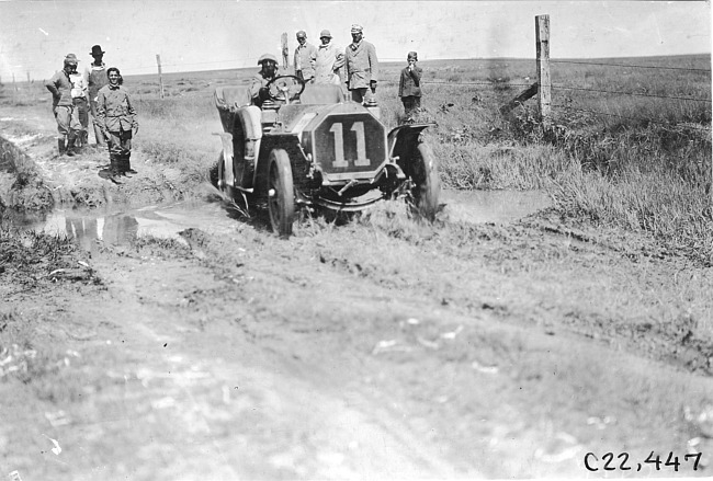 Buse in Thomas car crossing ditch near Aurora, Colo., at 1909 Glidden Tour