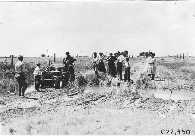Studebaker press car stuck in ditch near Aurora, Colo., at 1909 Glidden Tour