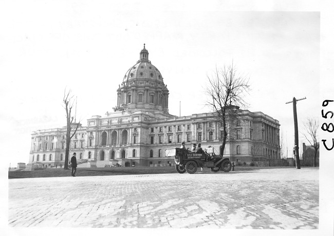 E.M.F pathfinder in front of municipal building, at 1909 Glidden Tour