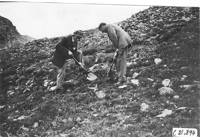 Lowry and D. McIntosh digging on Mt. McClellan, Colo., at 1909 Glidden Tour