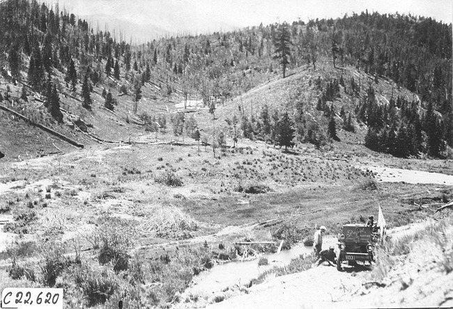 Rapid motor truck stopped along mountain road in Colo., at 1909 Glidden Tour