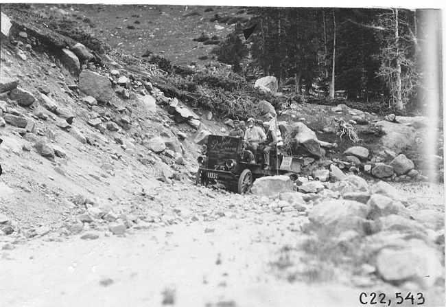 Rapid motor truck on rock covered mountain road in Colo., at 1909 Glidden Tour