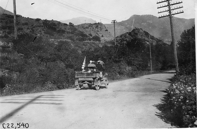 Rapid motor truck on mountain road in Colo., at 1909 Glidden Tour