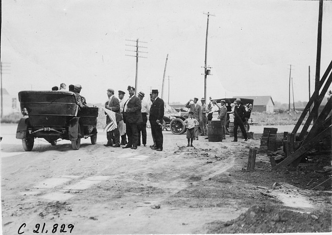 Small crowd watches Glidden tourists in Fremont, Colo., at 1909 Glidden Tour