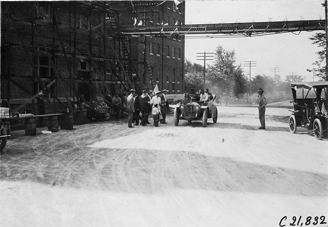 American simplex car in front of brewery in Fremont, Colo., at 1909 Glidden Tour