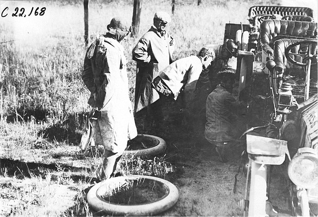 Tire trouble for Studebaker press car in Colo., at 1909 Glidden Tour