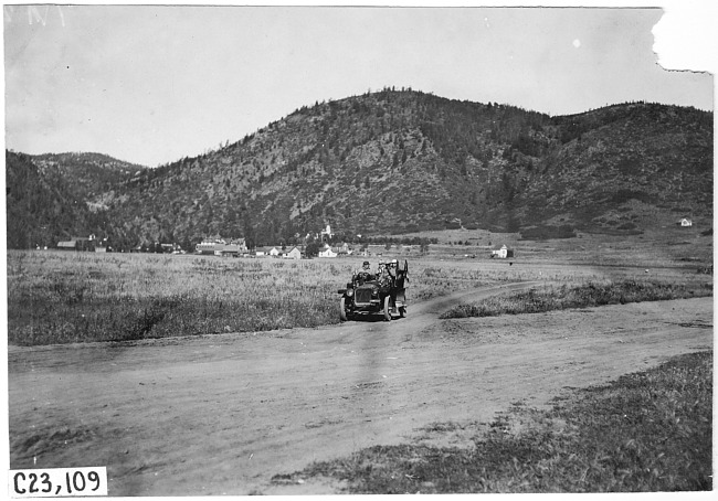 Studebaker car on rural road in Colo., at 1909 Glidden Tour
