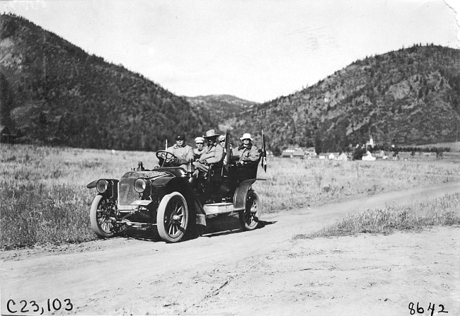Studebaker car on rural road in Colo., at 1909 Glidden Tour