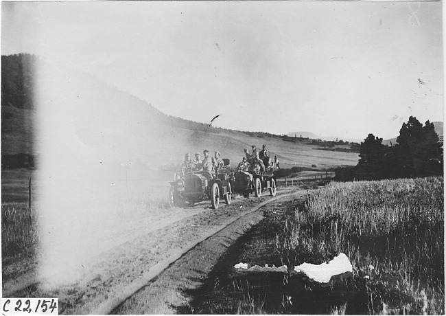 Studebaker cars on mountain road in Colo., at 1909 Glidden Tour