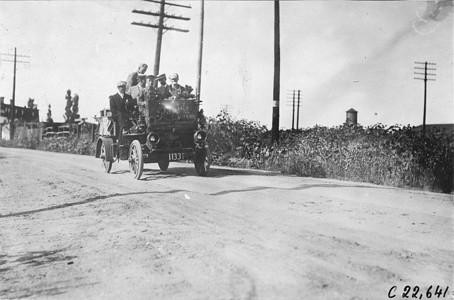 Rapid motor truck on rural road in Colo., at 1909 Glidden Tour