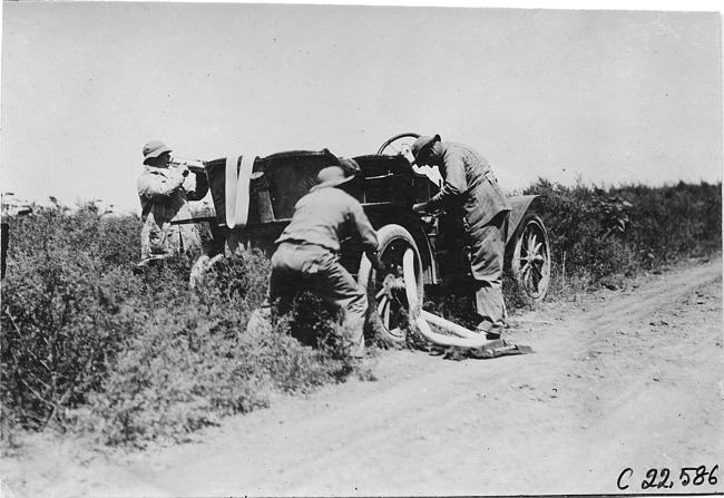 Moline car has tire trouble near Bunker Hill, Kan., at 1909 Glidden Tour