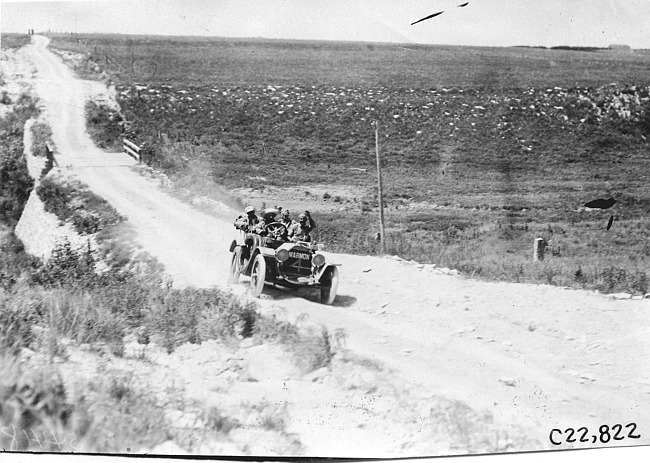 F. Wing in Marmon car on Bunker Hill in Kansas at 1909 Glidden Tour