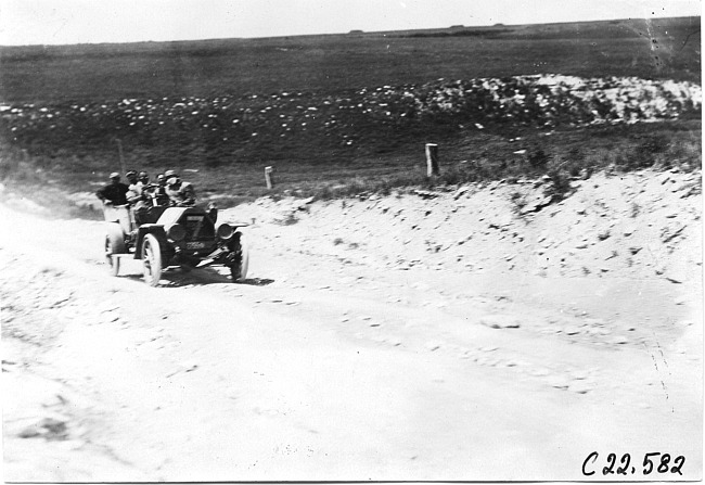O.H. Bernhardt in Jewell car on Bunker Hill in Kansas at 1909 Glidden Tour