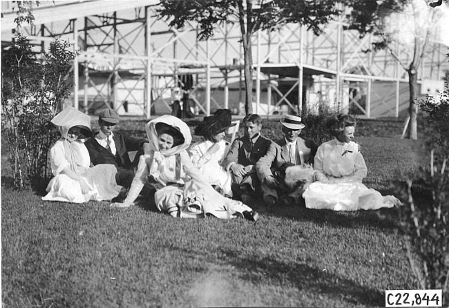 Glidden tourists sit with women in Salina, Kan., at 1909 Glidden Tour