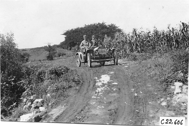 Brush car on rural road near Junction City, Kan., at 1909 Glidden Tour