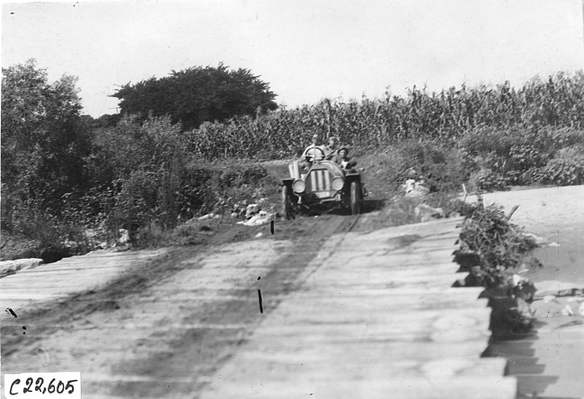 Jewell car crossing wooden bridge near Junction City, Kan., at 1909 Glidden Tour