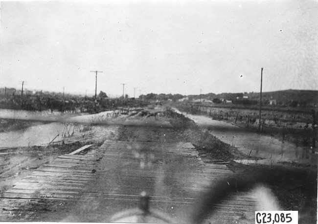 View from front of car of plank road near Junction City, Kan., at 1909 Glidden Tour