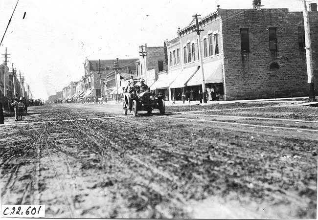 Chalmers car on city street in Junction City, Kan., at 1909 Glidden Tour