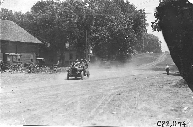 George Smithson in Studebaker car entering Manhattan, Kan., at the 1909 Glidden Tour