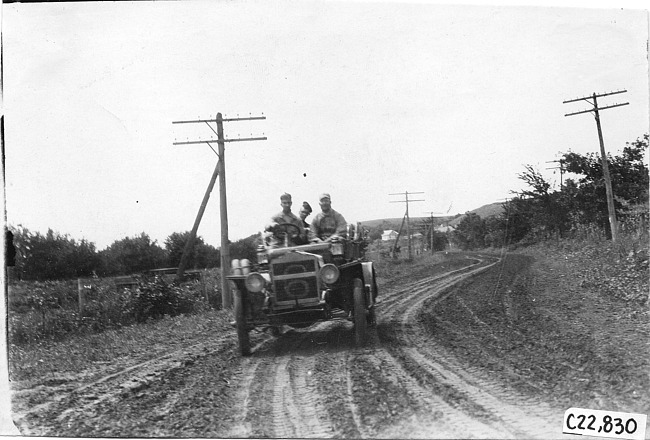 Maxwell car on rural road near Manhattan, Kan., at 1909 Glidden Tour