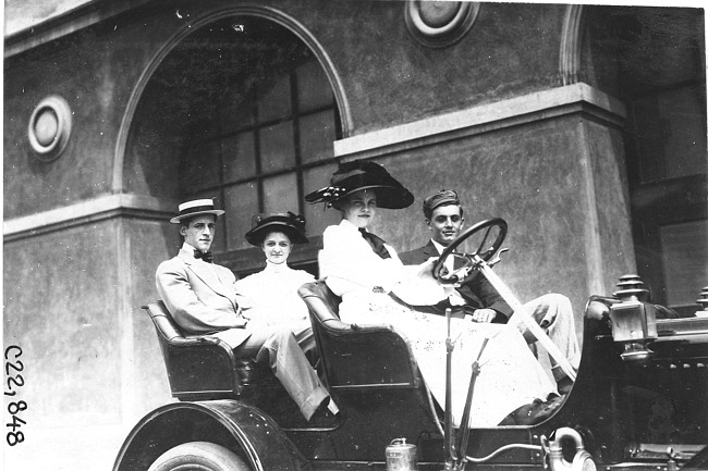 Two couples sit in Maxwell car in Kansas City, Mo., at 1909 Glidden Tour