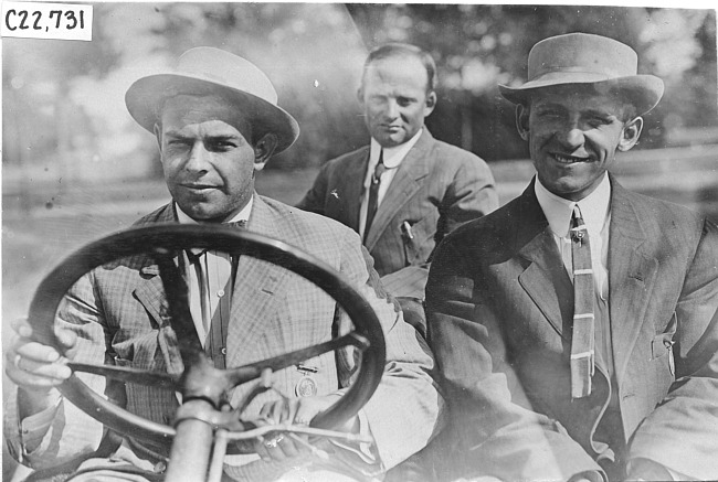 John Williams posed in Pierce car in Kansas City, Mo., at 1909 Glidden Tour