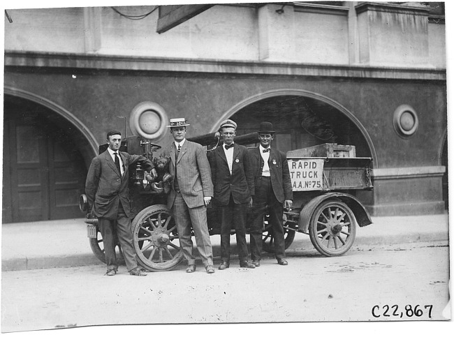 Men posed with Rapid truck in Kansas City, Mo., at 1909 Glidden Tour