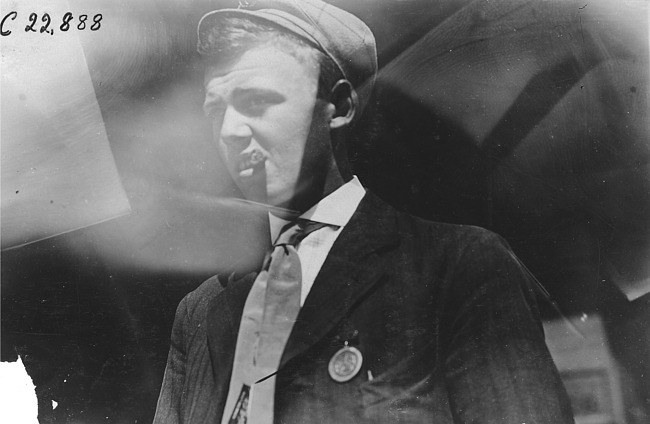 Jim Carey, driver of Rapid motor truck, at 1909 Glidden Tour