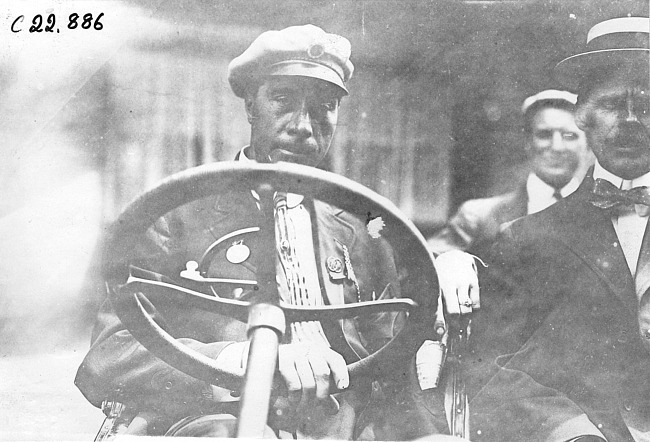 Unidentified Glidden tourists posed in car, at 1909 Glidden Tour