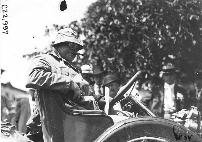 Dai Lewis posed in car, at 1909 Glidden Tour