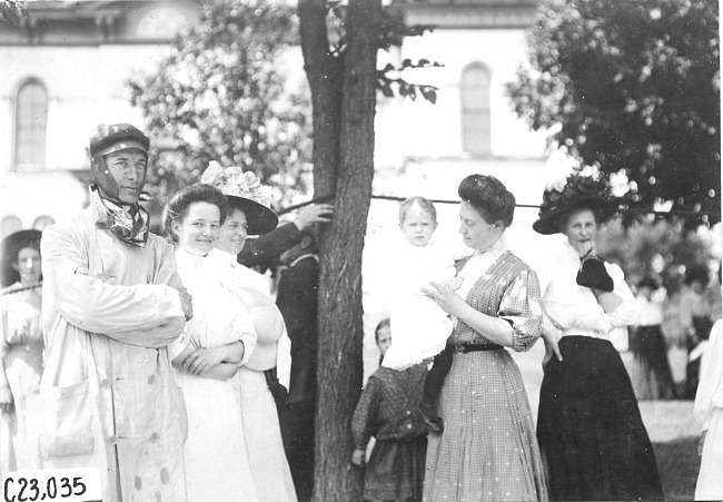 Glidden tourist posed with women and a child, at 1909 Glidden Tour