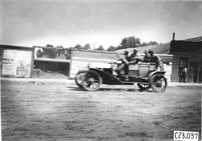 Glidden participants in rural town, at the 1909 Glidden Tour