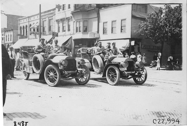 Glidden participants on downtown street, at the 1909 Glidden Tour