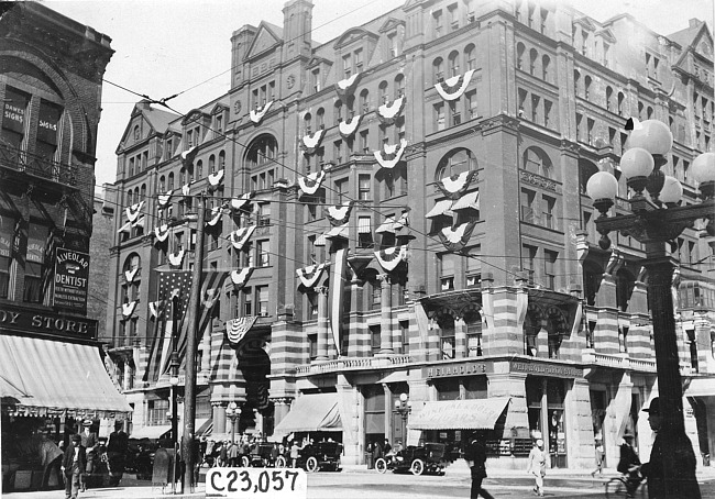 Tour participants in downtown commercial area, at the 1909 Glidden Tour