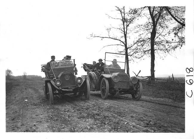 E.M.F. car on rural road with other car, on pathfinder tour for 1909 Glidden Tour