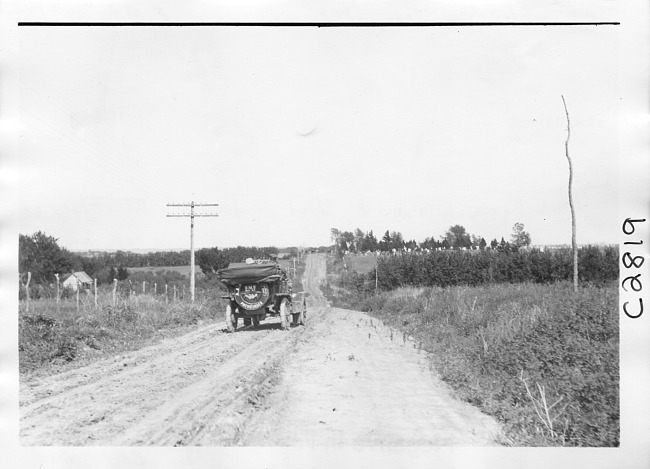 E.M.F. car on rural road, on pathfinder tour for 1909 Glidden Tour
