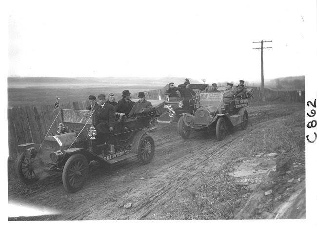 E.M.F. cars and Buick on rural road, on pathfinder tour for 1909 Glidden Tour