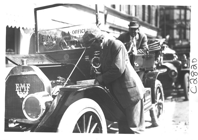 E.M.F. car with hood open, on pathfinder tour for 1909 Glidden Tour