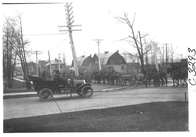 E.M.F. car with soldiers, on pathfinder tour for 1909 Glidden Tour